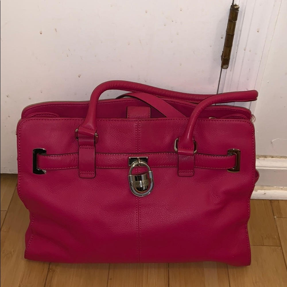 A hot pink Calvin Klein Purse